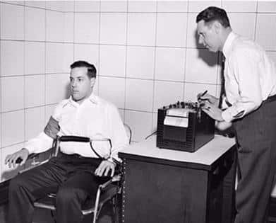 John Larson at right demonstrating his "polygraph" lie detector machine at Northwestern University about 1936